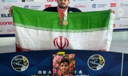 ایزدی مدال‌های طلا و برنز خود را به شهید ماکان نصیری اهدا کرد
